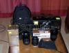 SLR Nikon D3100 + obiettivo + attrezzatura