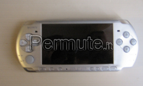 Psp con caricatore e 4 giochi